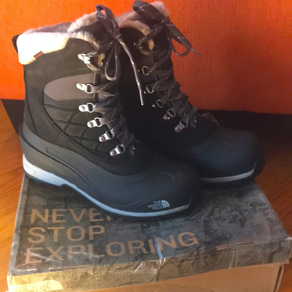 The North Face faux fur-lined, lace-up, black winter boot.